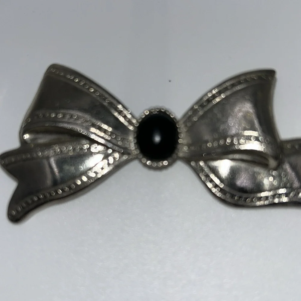 Silver Tone Bow Brooch with Black Center